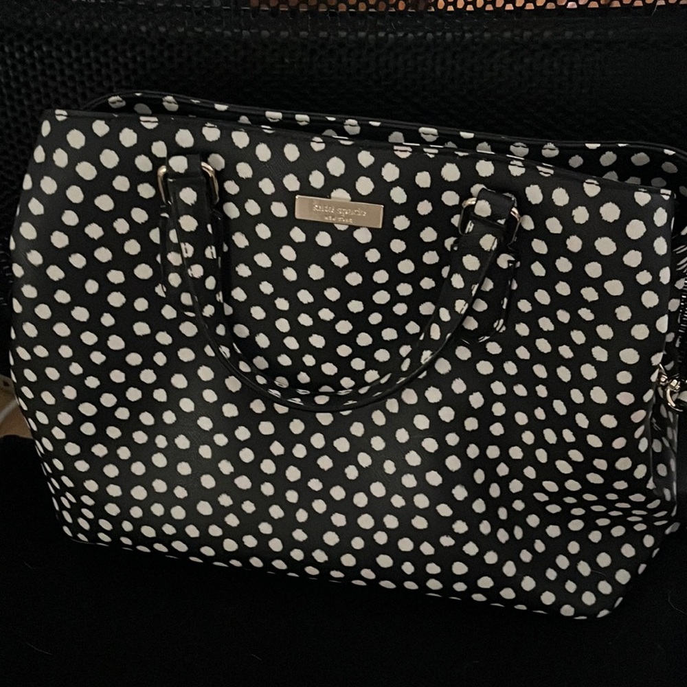 Polka dot black and white Kate spade purse.